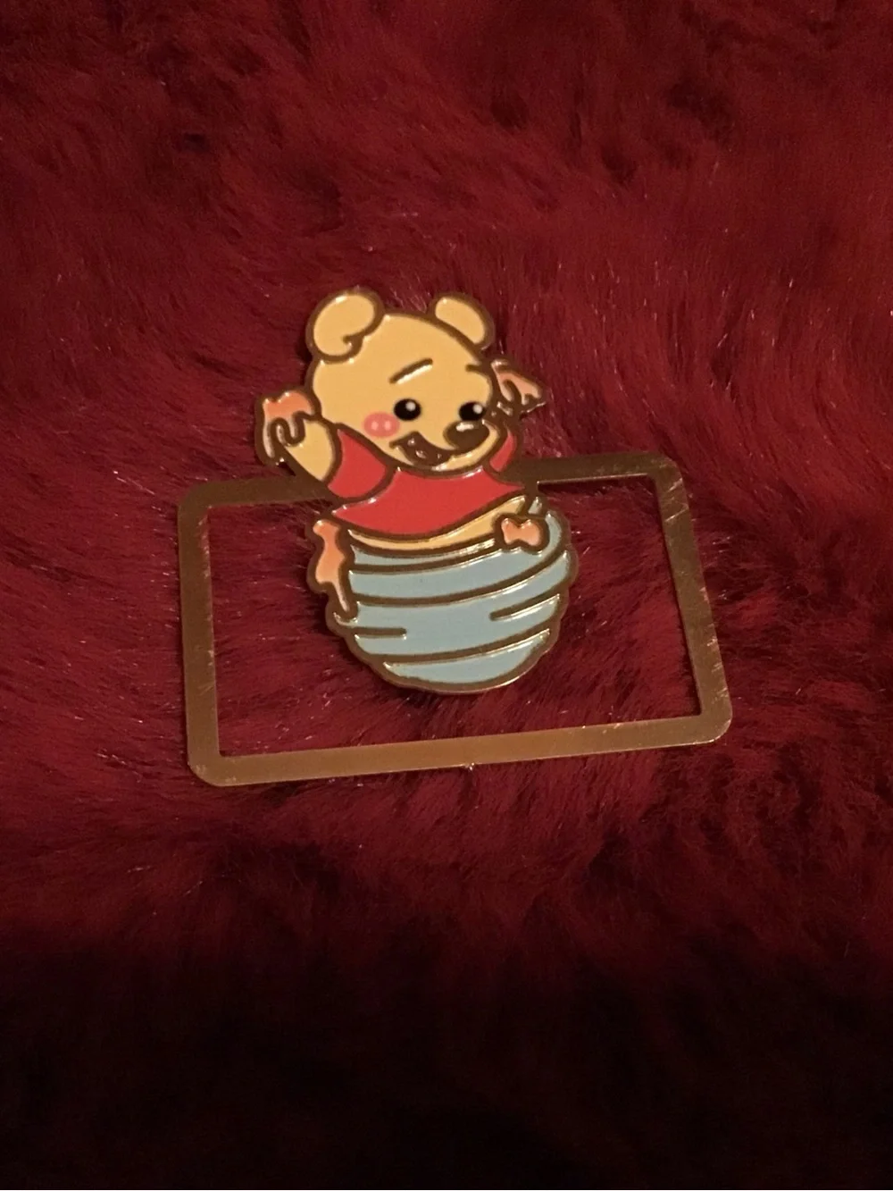 Metal bookmark with Winnie the Pooh design. Super cute!!